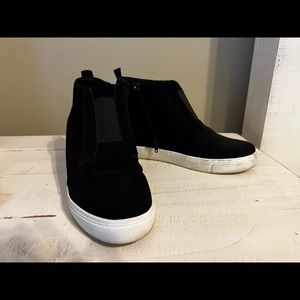 Steve Madden Black High-Top Zip Sneakers.